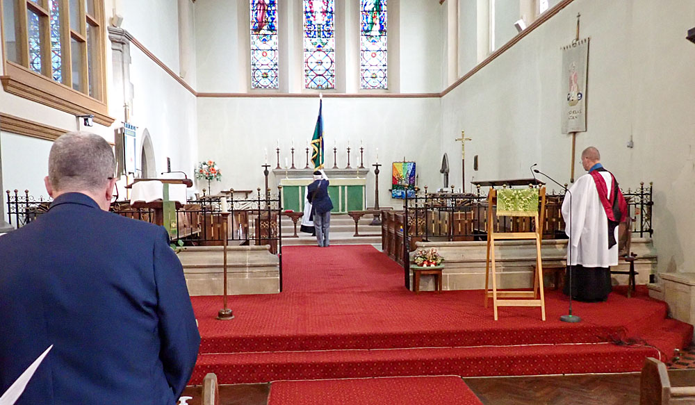 14. The Standard is handed back to the Bearer, who brings it forward to the rood screen.
